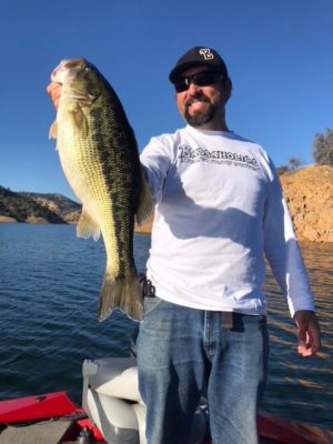 Bassaholics proudly holding giant spotted bass