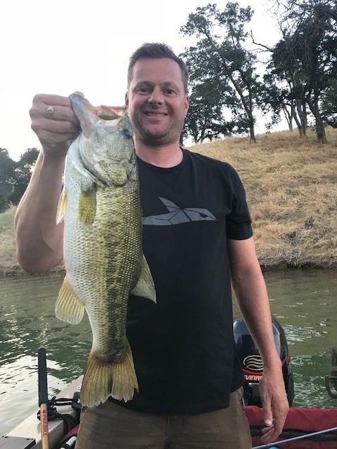 Stoked to catch a personal best bass in one of the Mother Lode lakes