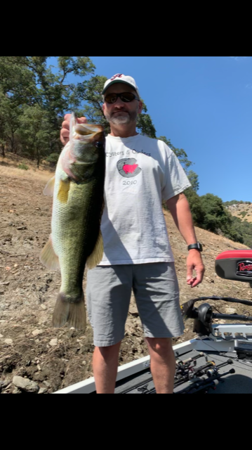 The first of two personal best bass caught in one guided trip