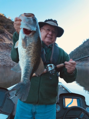 Great bass for a great man. Never to old to get out and hook some giants with Xperience Fishing Guide Service